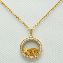 Load image into Gallery viewer, Close up image of 18 carat gold pendant with natural gold encased in strengthened glass