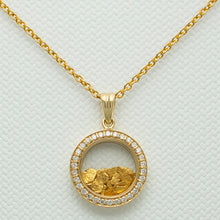 Load image into Gallery viewer, Close up image of 18 carat gold pendant with natural gold encased in strengthened glass
